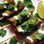 Savor Beef Kofta Skewers with Creamy Yogurt Dip Delight